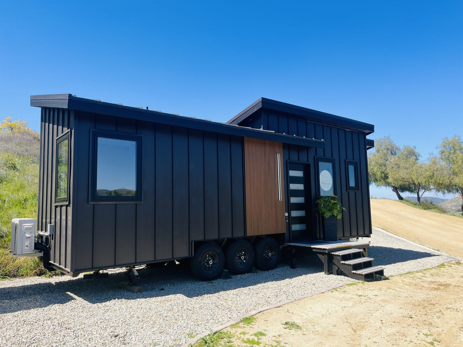 The Modern Moody—A 255-sqft Tiny House with Bold Design & a Main-Floor Bedroom!