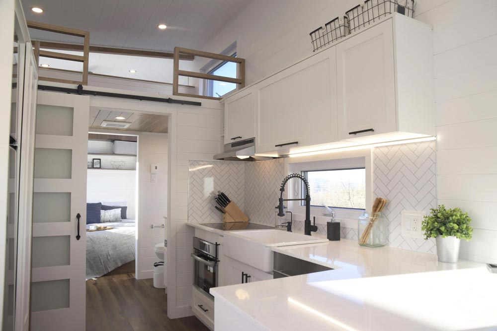 10.5’ x 36.5’ “Magnolia” Tiny Home on Wheels by Minimaliste Tiny Houses