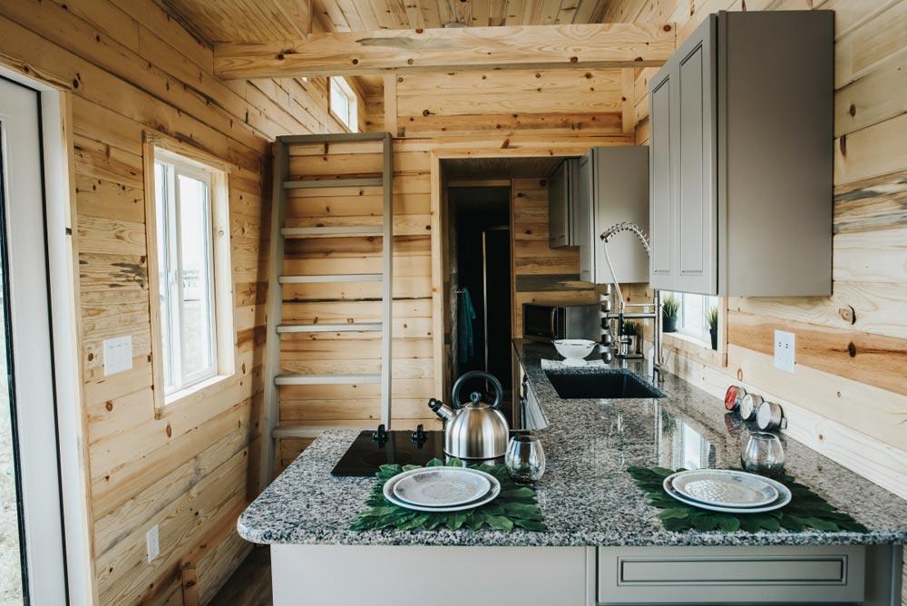 Rustic "Four Eagle" Tiny House on Wheels by The Tiny Home Co.